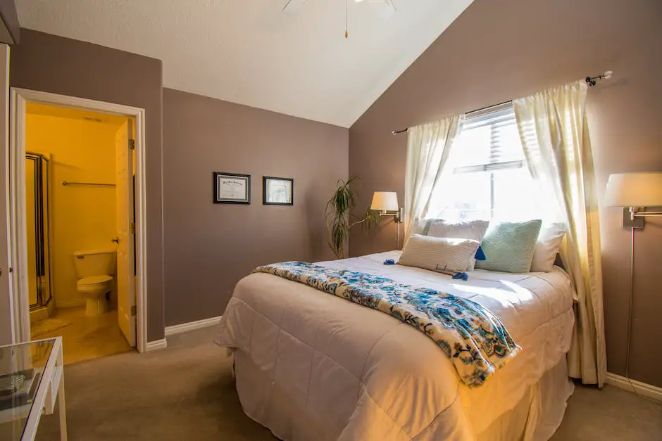 A clean and organized bedroom with a comfortable bed, fresh linens, and bright decor.